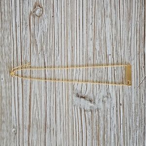 Gold 7" bar necklace with heart, $5